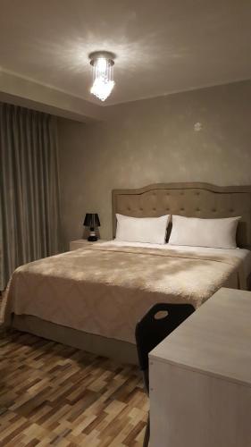Terraza Apart Hotelにあるベッド