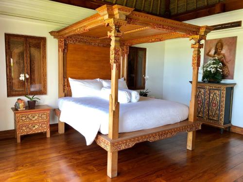 Säng eller sängar i ett rum på Luxury Villa Perla