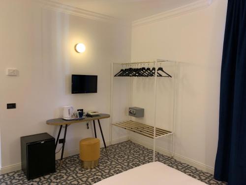 TV a/nebo společenská místnost v ubytování Demidoff Hotel Milano