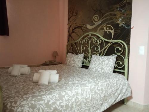 Cama ou camas em um quarto em Villa Lucy