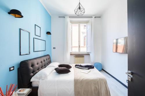 Ліжко або ліжка в номері A World Aparts - 32 Modena