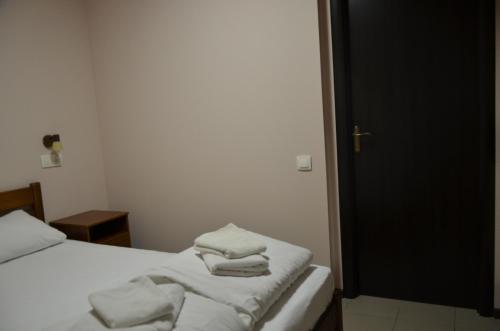 Ένα ή περισσότερα κρεβάτια σε δωμάτιο στο Hostel VShokoladi