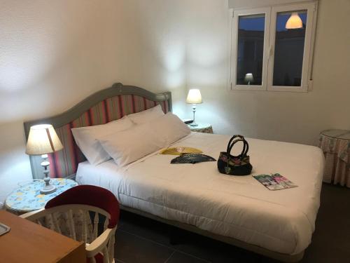 Ένα ή περισσότερα κρεβάτια σε δωμάτιο στο Fercamar Costacabana