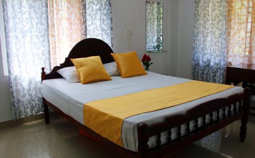 Voodi või voodid majutusasutuse Darpana Homestay toas