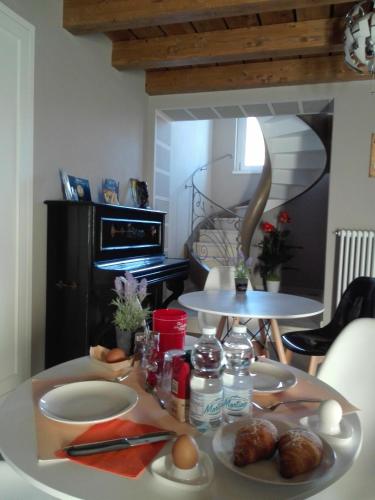 a table with plates of food on top of it at eden in Cannobio