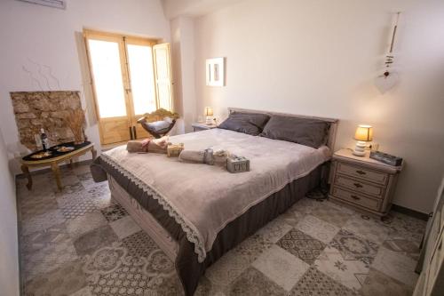Posteľ alebo postele v izbe v ubytovaní La Maison d'Irene