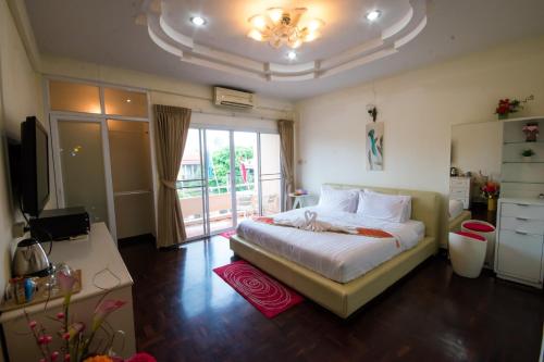 Postel nebo postele na pokoji v ubytování Maria Room HuaHin