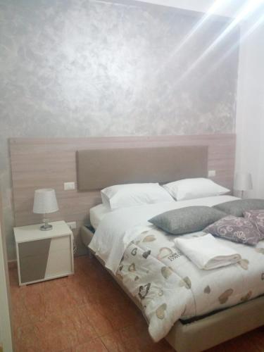 Кровать или кровати в номере Beauty House
