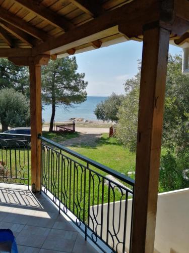 a balcony with a view of the ocean at Family House by the Sea in Nikiti
