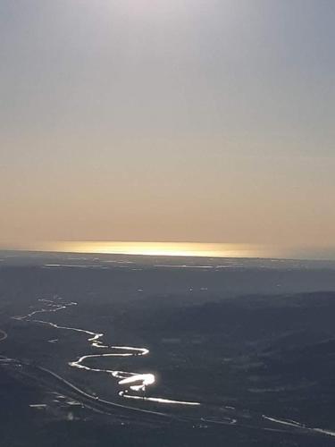 a view of the ocean from an airplane at La Casa dei Panorami di Colobraro in Colobraro