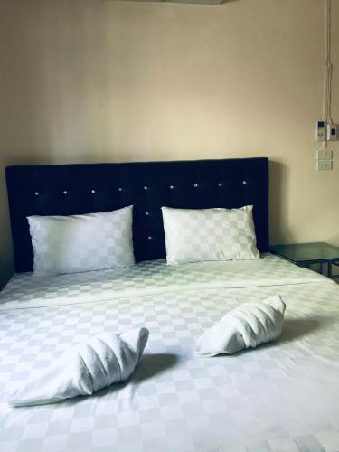 Postel nebo postele na pokoji v ubytování Baan Bon Resort Bang Tabun