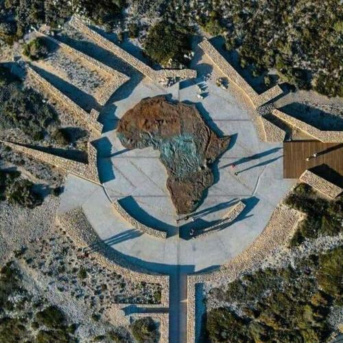 an aerial view of a map of the earth at Colours of the Sea Apartment in Struisbaai