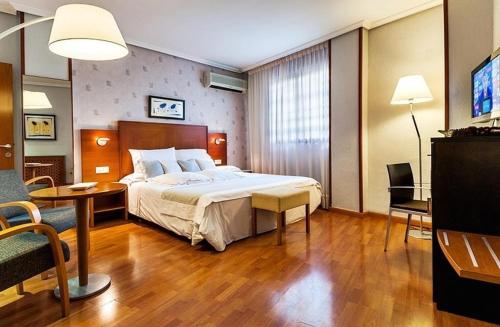 Postel nebo postele na pokoji v ubytování Hotel Xauen