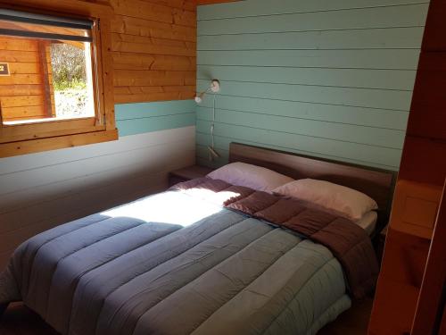 Un pat sau paturi într-o cameră la Casa Del Torrente
