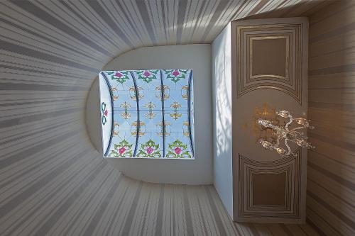 Un pat sau paturi într-o cameră la Meserret Palace Hotel - Special Category