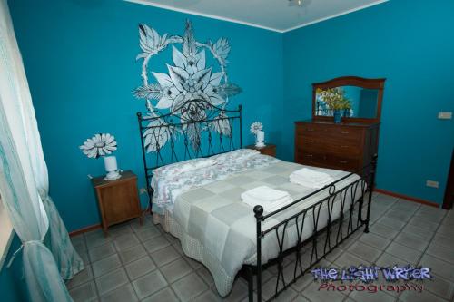 Cama ou camas em um quarto em Etna Travellers B&B