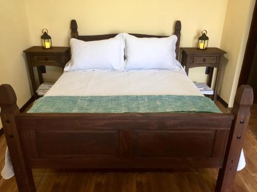 Un pat sau paturi într-o cameră la Hospedaje “ El Segoviano “