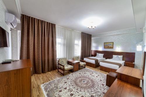 Svetainės erdvė apgyvendinimo įstaigoje Hotel Osh-Nuru