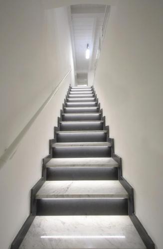 a staircase in a white building with a stair case at Best Vasto in Vasto