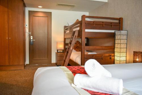 Cama o camas de una habitación en Altitude Nozawa