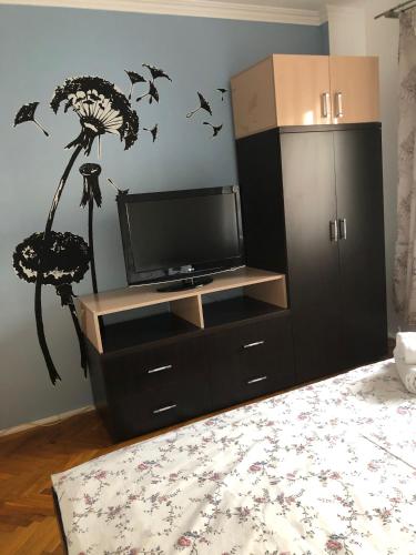 Μια τηλεόραση ή/και κέντρο ψυχαγωγίας στο Blue Apartment