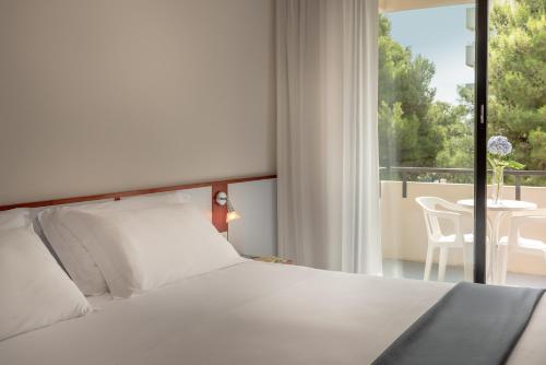 Кровать или кровати в номере Hotel Baltic