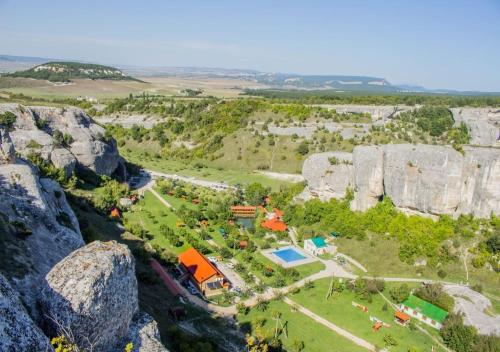 an aerial view of a resort on the rocks at Эко Усадьба Эски Кермен in Bakhchysarai