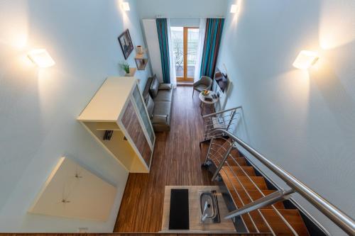 an overhead view of a staircase in a house at Trip Inn Residence City Center in Frankfurt/Main