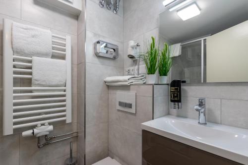 Kylpyhuone majoituspaikassa Trip Inn Residence City Center