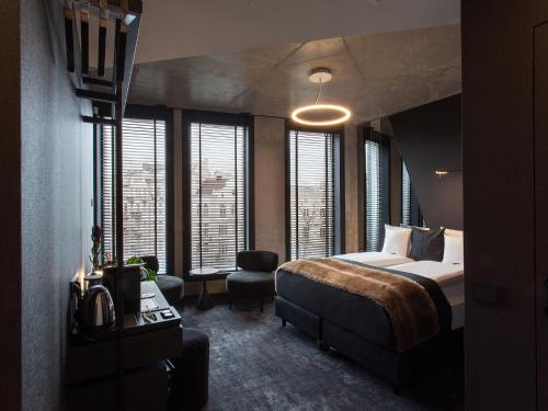 Posteľ alebo postele v izbe v ubytovaní The Loft Hotel Adults Only
