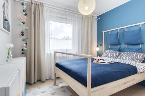 Posteľ alebo postele v izbe v ubytovaní Elite Apartments City Center Suites