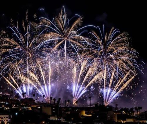 a fire show with fireworks in the sky at Canarian House with views and pool in Los Realejos