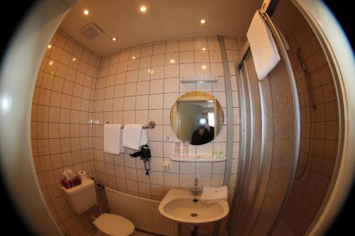 Koupelna v ubytování Hotel Stadt Munster