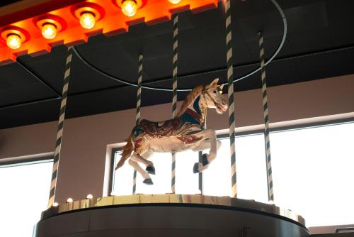 a wooden horse on top of a carousel at Best Western Plus Åby Hotel in Mölndal