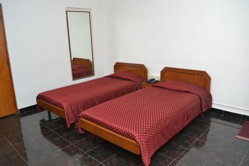 The Cottage tesisinde bir odada yatak veya yataklar