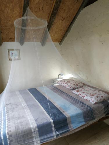 Postel nebo postele na pokoji v ubytování Posada dos Palmas