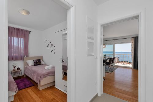 Posteľ alebo postele v izbe v ubytovaní Apartment Silver