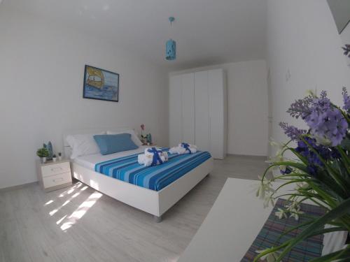 Posteľ alebo postele v izbe v ubytovaní Oudeis Holidays Apartments Tropea