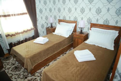 Кровать или кровати в номере Xum Don