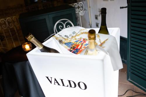a white box with two bottles of wine at Le Due Sicilie in Tropea
