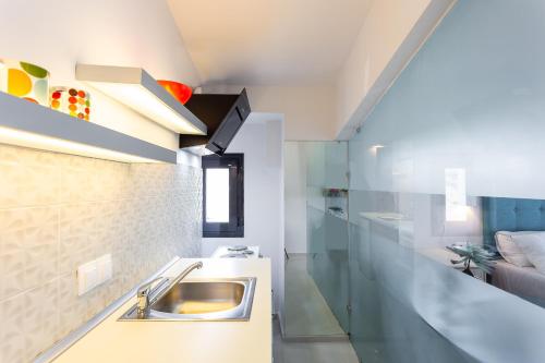 Kuchyň nebo kuchyňský kout v ubytování Rethymno Hills Apartments