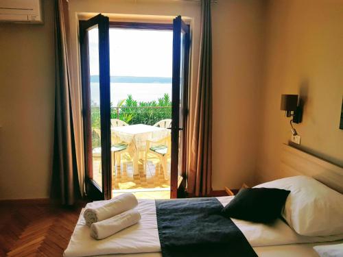Postel nebo postele na pokoji v ubytování Apartma Kočevar Portorož