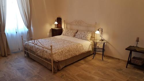 A bed or beds in a room at La Salita B&B