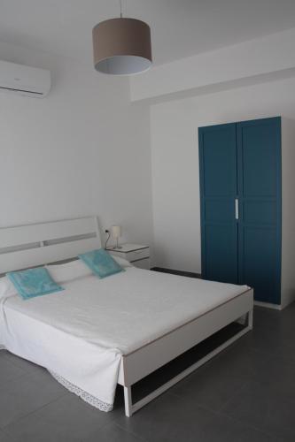Posteľ alebo postele v izbe v ubytovaní Gli olivi