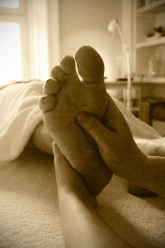 a person holding a baby in their hands at The Old Rectory in Annan