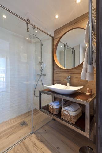 a bathroom with a sink and a mirror at Residence Provencal - Luxurious - 300m Palais - LRA CANNES in Cannes