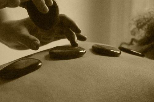 a person holding a knife and two pickles on a table at The Old Rectory in Annan