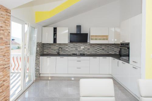 Kuchyň nebo kuchyňský kout v ubytování Apartman Franko