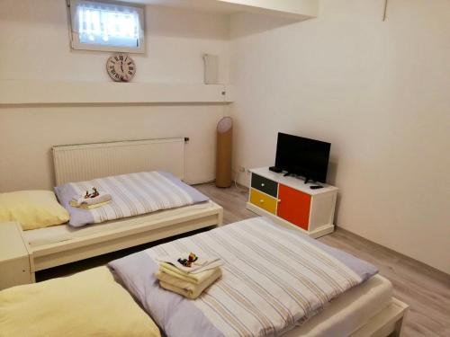 Postel nebo postele na pokoji v ubytování Apartment Souterrain für Monteure Nr 2