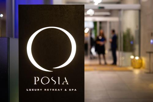 a sign that says pesta luxury retreat and spa at Posia Retreat & Spa UNA Esperienze in San Foca